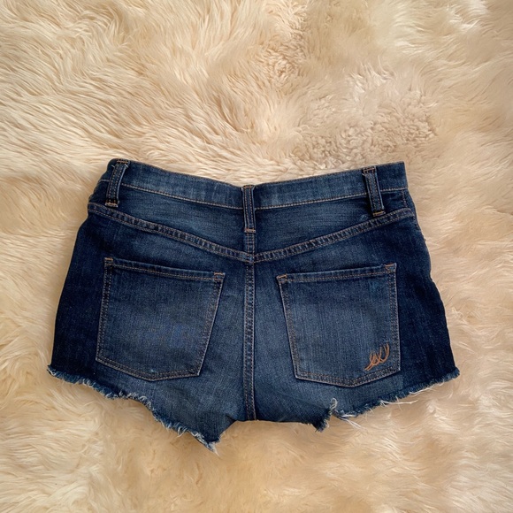 Express Mid Rise Buttonfly Distressed Jeans - Picture 2 of 4